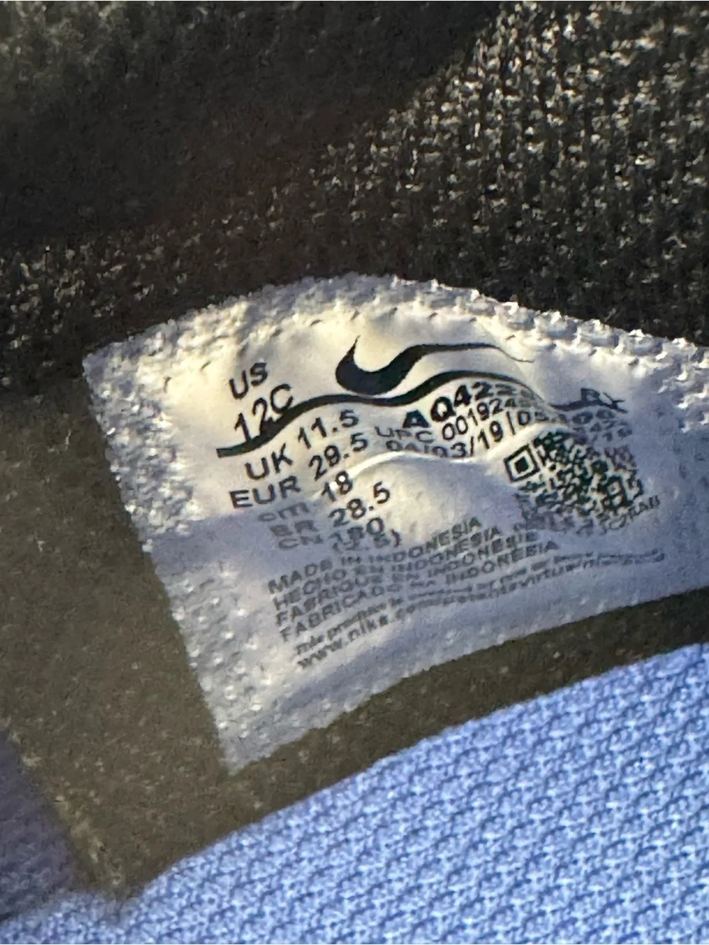 Nike Team Hustle Kids' High-Top Sneakers in Royal Blue and Black